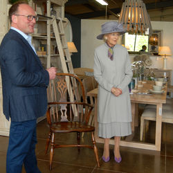 HRH is presented with an iconic Windsor chair by Julian Brown